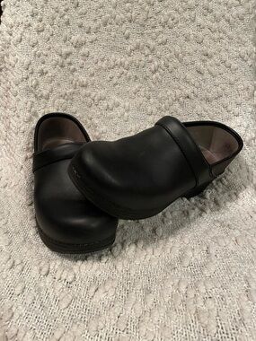 Dansko Black Leather Slip-On Clogs